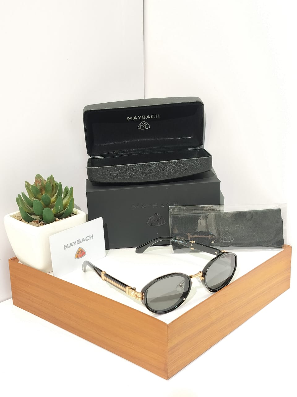 Luxury Executive Oval Sunglasses - Gold Metal Bridge Black Acetate Shades
